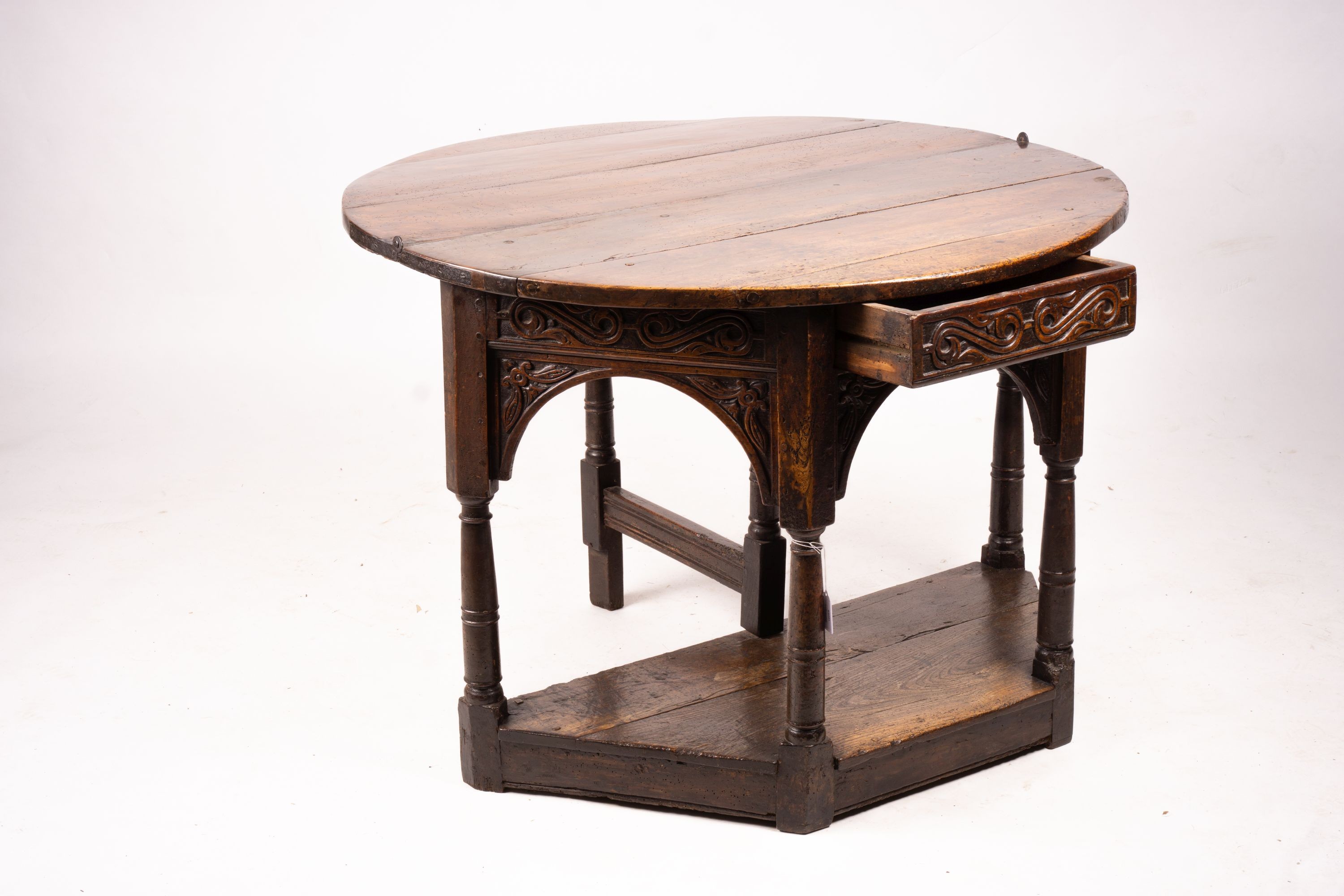 A 17th century oak credence table, width 108cm, depth 52cm, height 77cm